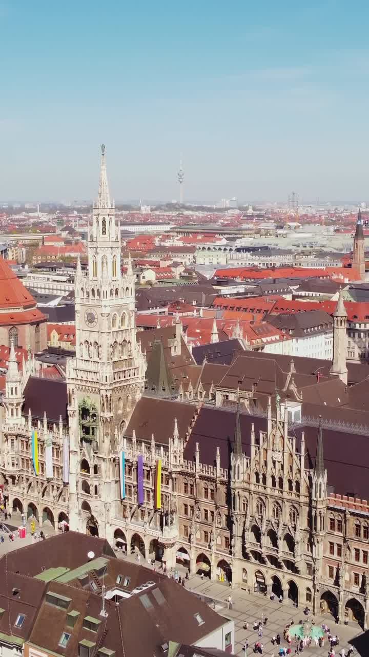 New Town Hall (Neues Rathaus) And Marienplatz in Munich, Bavaria, Germany. - aerial vertical shot