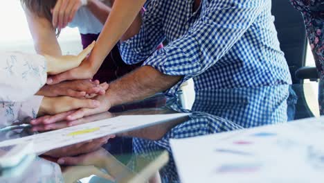 Group-of-executives-forming-hand-stack-4k