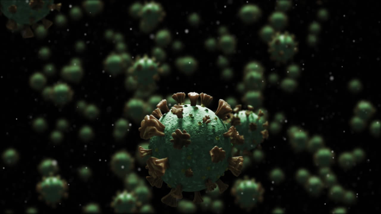 múltiples células de covid-19 que se mueven contra un fondo negro