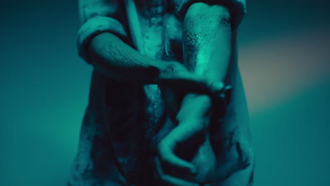 close up of person's arms and hands