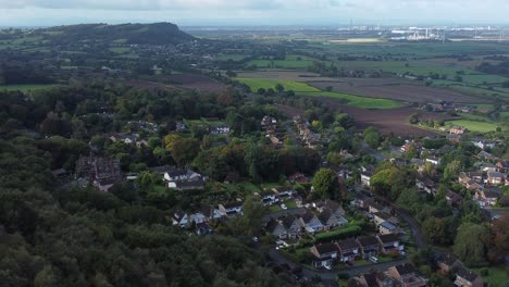 Aerial-view-above-Cheshire-North-England-viewpoint-out-across-Snowdonia-North-Wales-vast-countryside-orbiting-left-shot