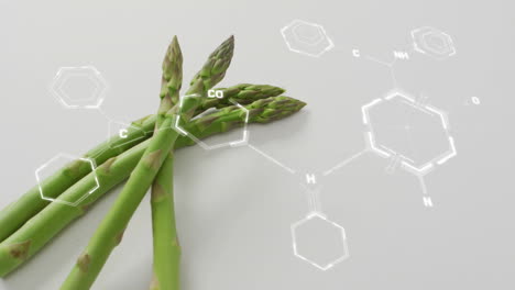 animation of chemical formula over asparagus