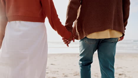 back, holding hands and a couple walking