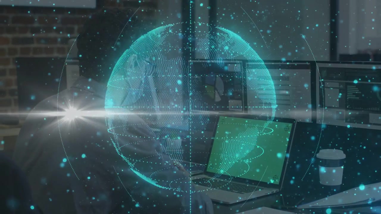 Man behind holographic globe typing, globe appearing, rotating, revealing monitors and showing tech