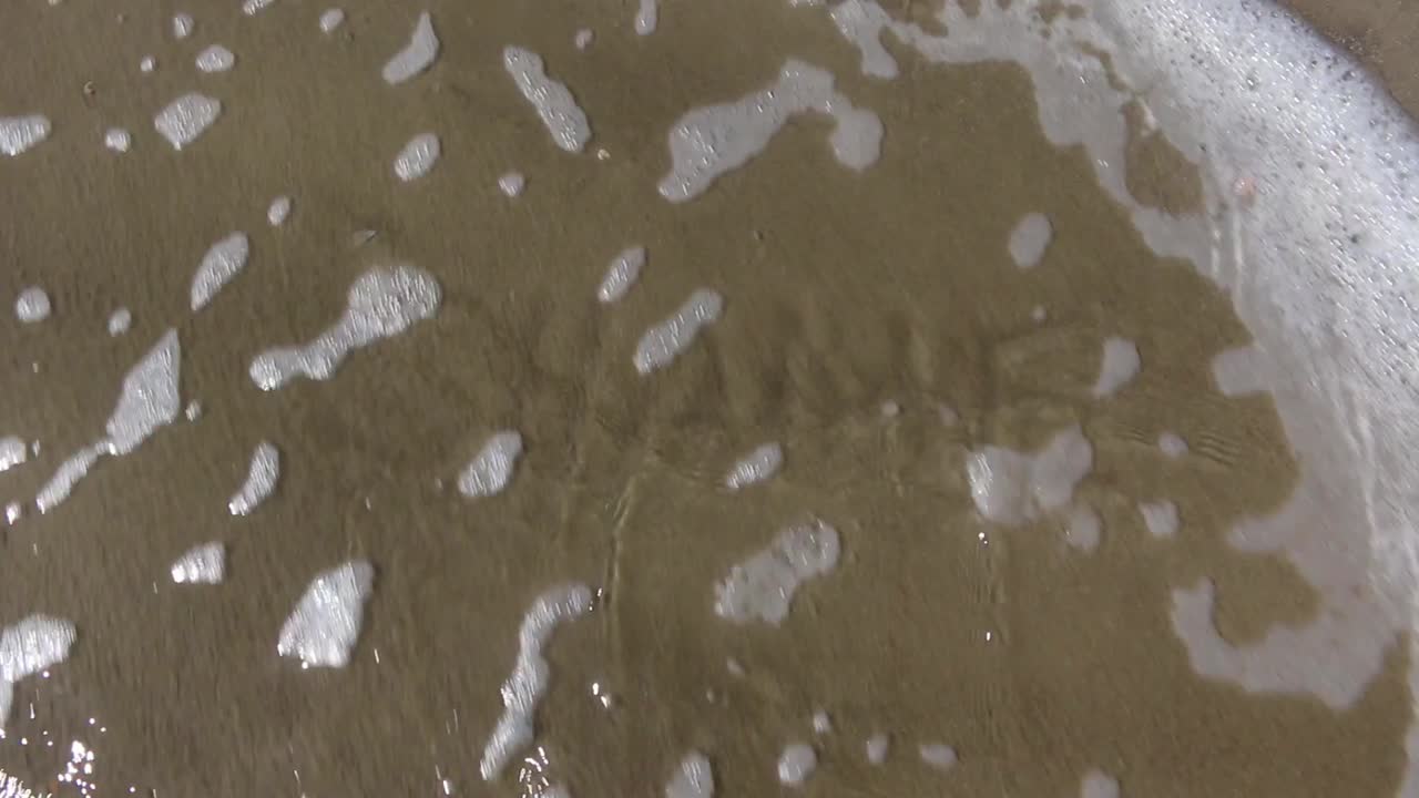 Shame washed away by living water from the ocean beach