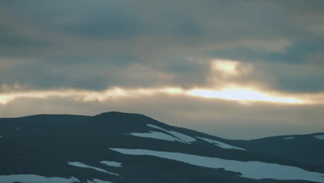 Sunset-above-Norwegian-mountain-of-Ryfjallet,-loopable-timelapse