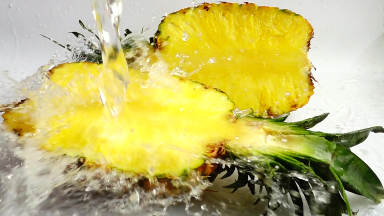 Fresh ripe pineapple. Slow motion.