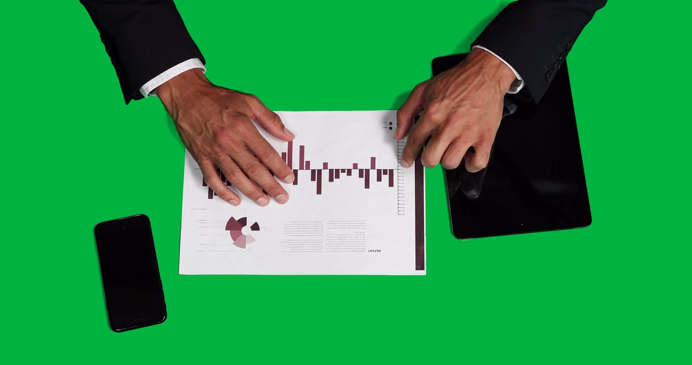 Business man on green background
