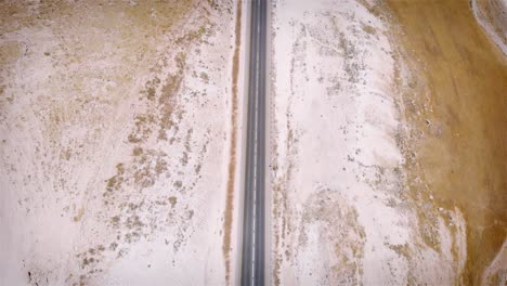 aerial view of a road through a desert landscape