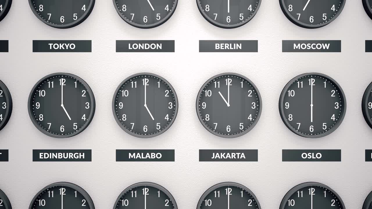 Round Clocks Show Different Time Zones On White Wall. Camera Moves Left To Right. Clock Face Timelapse