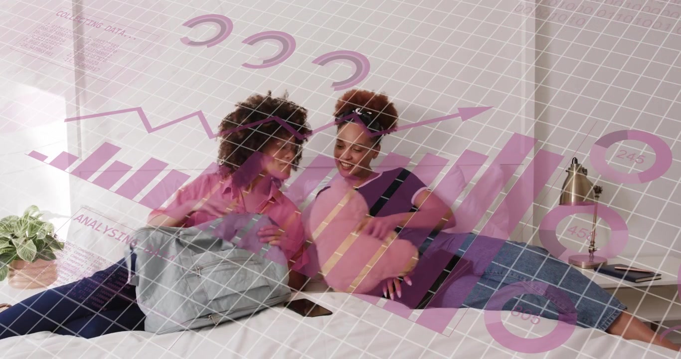 woman reclining on bed holding tablet, friend entering with tote rummaging for technology talk