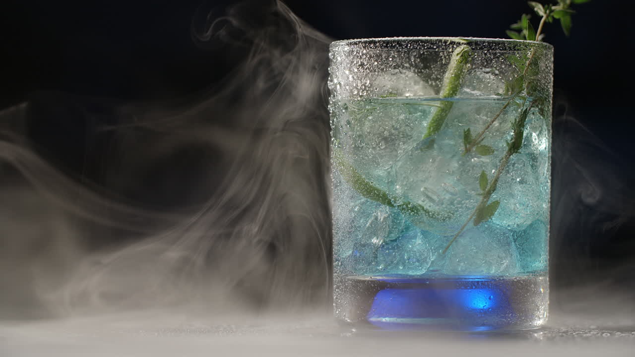 Blue Cocktail with Lime and Ice
