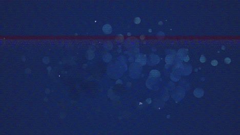 animation of blue bokeh lights forming abstract pattern on dark background