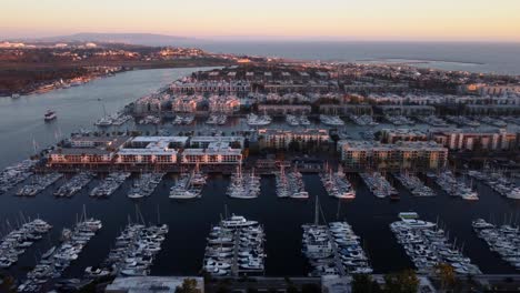 Wide-angle-establish-drone-shot-Marina-Del-Rey-yachts-docked-in-basin