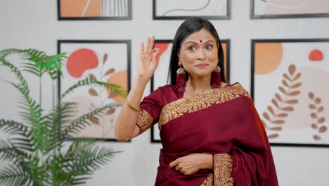 Indian-woman-showing-Okay-sign