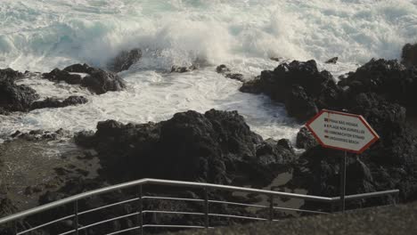 unsupervised beach sign in caniçal, madeira island, portugal.