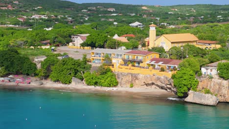 misa di san pedro or saint peter's church overlooks caribbean sea on sunny day