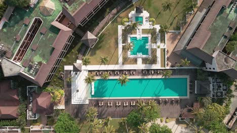 drone descending view of a empty swimming pool birds eye view