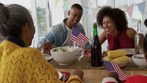 multi-generation family having celebration meal