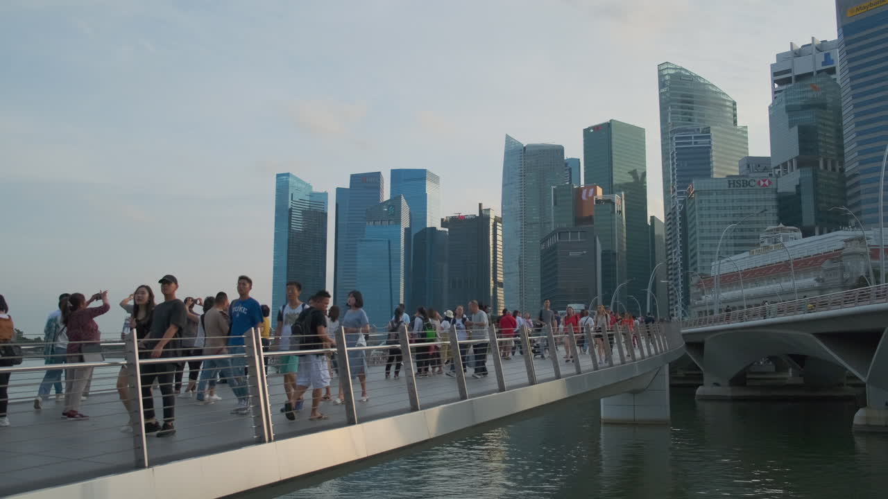 Singapore Skyline and Bridge with People