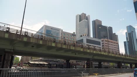 cityscape with skyscrapers and overpass