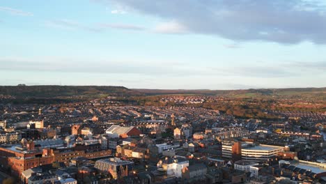 aerial backward shot of long stretched city during daytime in scarborough north yorkshire, england