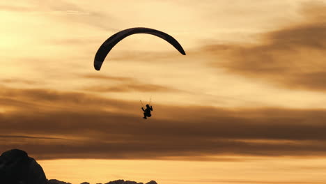 paragliding at sunset