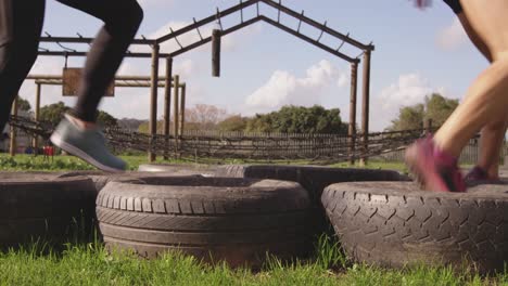 young adults training at an outdoor gym bootcamp