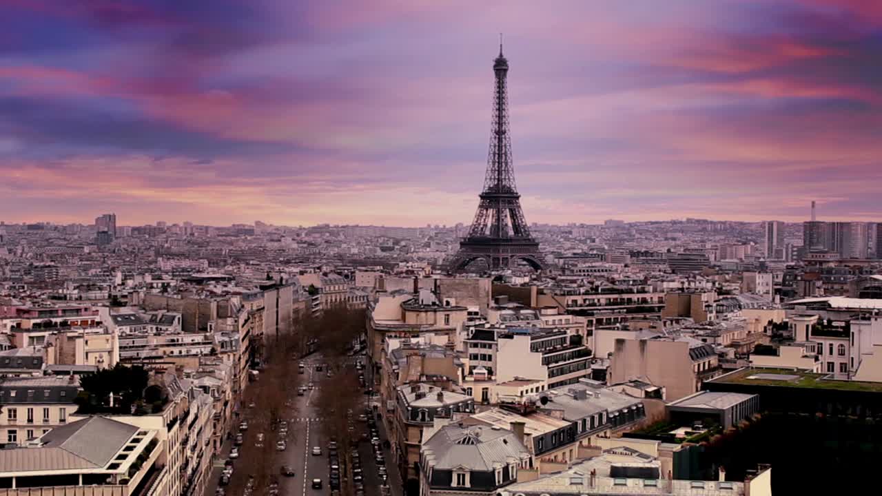 Aerial View of Paris Cityscape with Eiffel Tower at Sunset