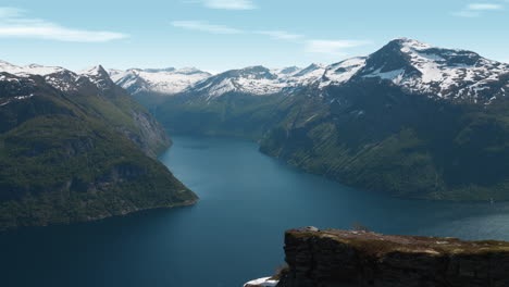 view from sætrenibba where you can see a norwegian fjord landscape at on top of a mountain at summer