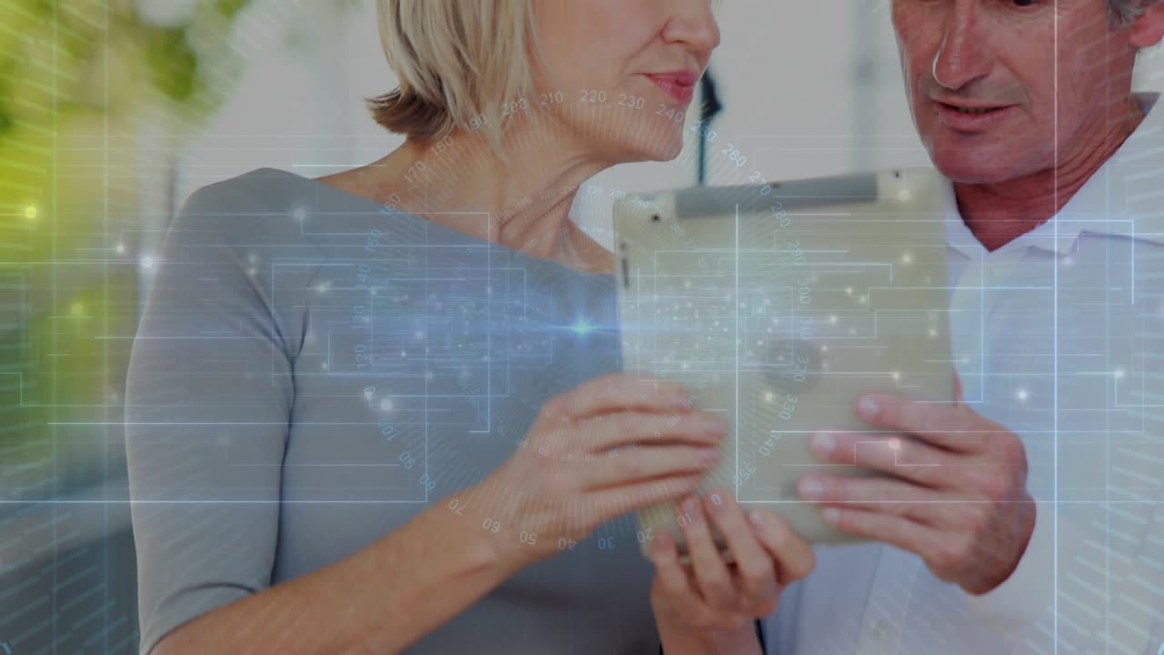 Mature man and woman tapping tablet, shifting grip, scanning animated HUD, discovering tech insight