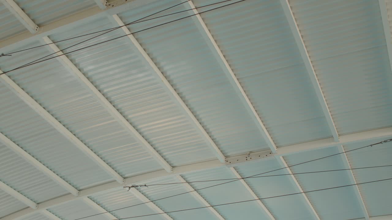 Sunlight Dancing on the Water: A Rooftop Pool's Reflective Symphony