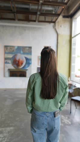 woman visiting an art gallery