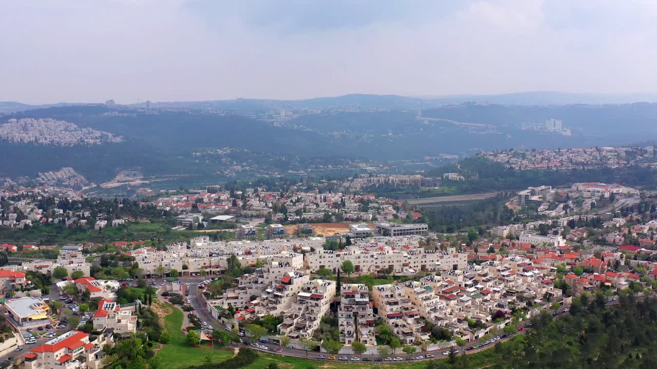 Aerial View of a Residential City in a Valley Landscape