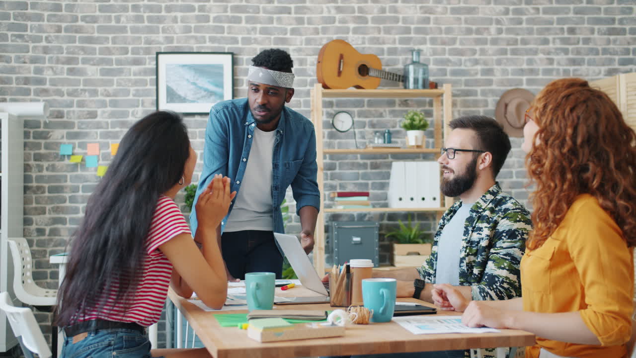 Diverse Team Brainstorming in Modern Office