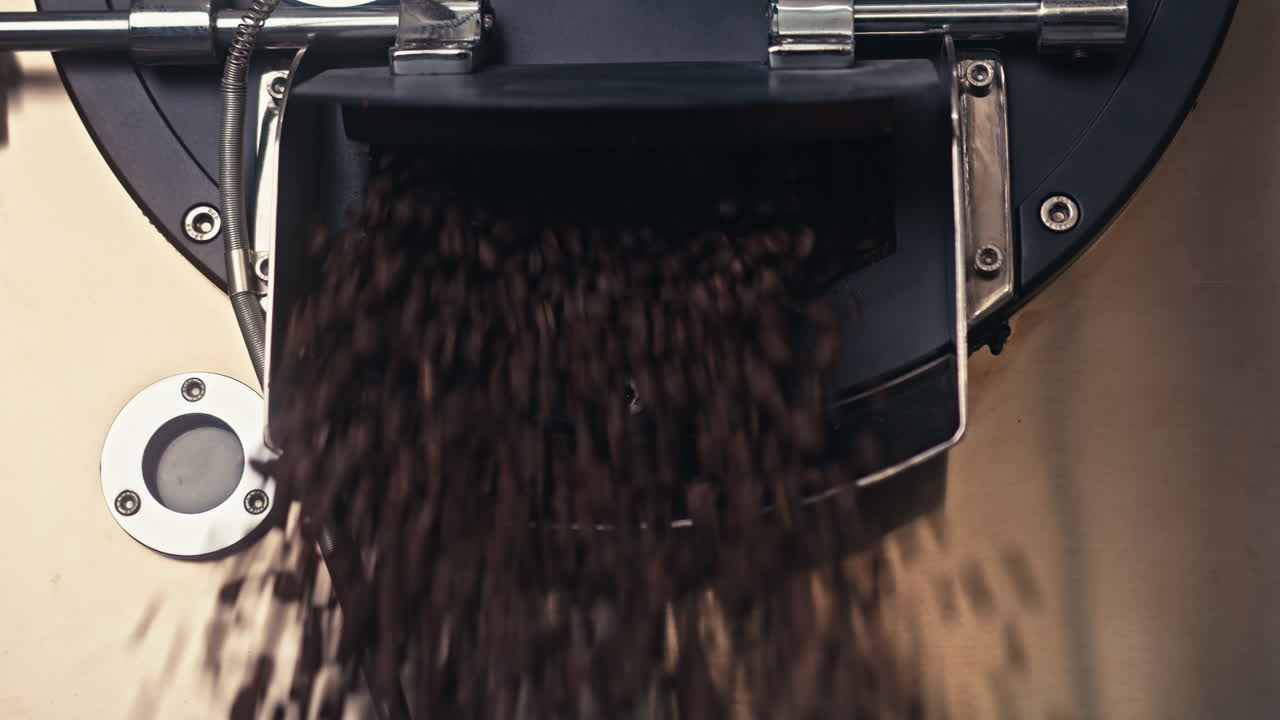 Coffee Beans Pouring from Roasting Machine