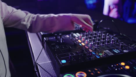 dj mixing music at a nightclub