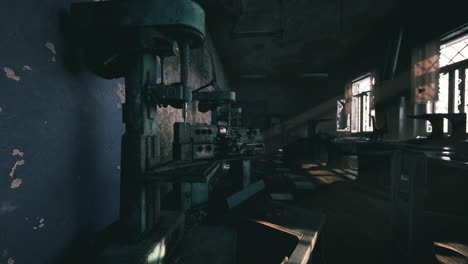 old industrial machinery in a dimly lit workshop with worn surfaces