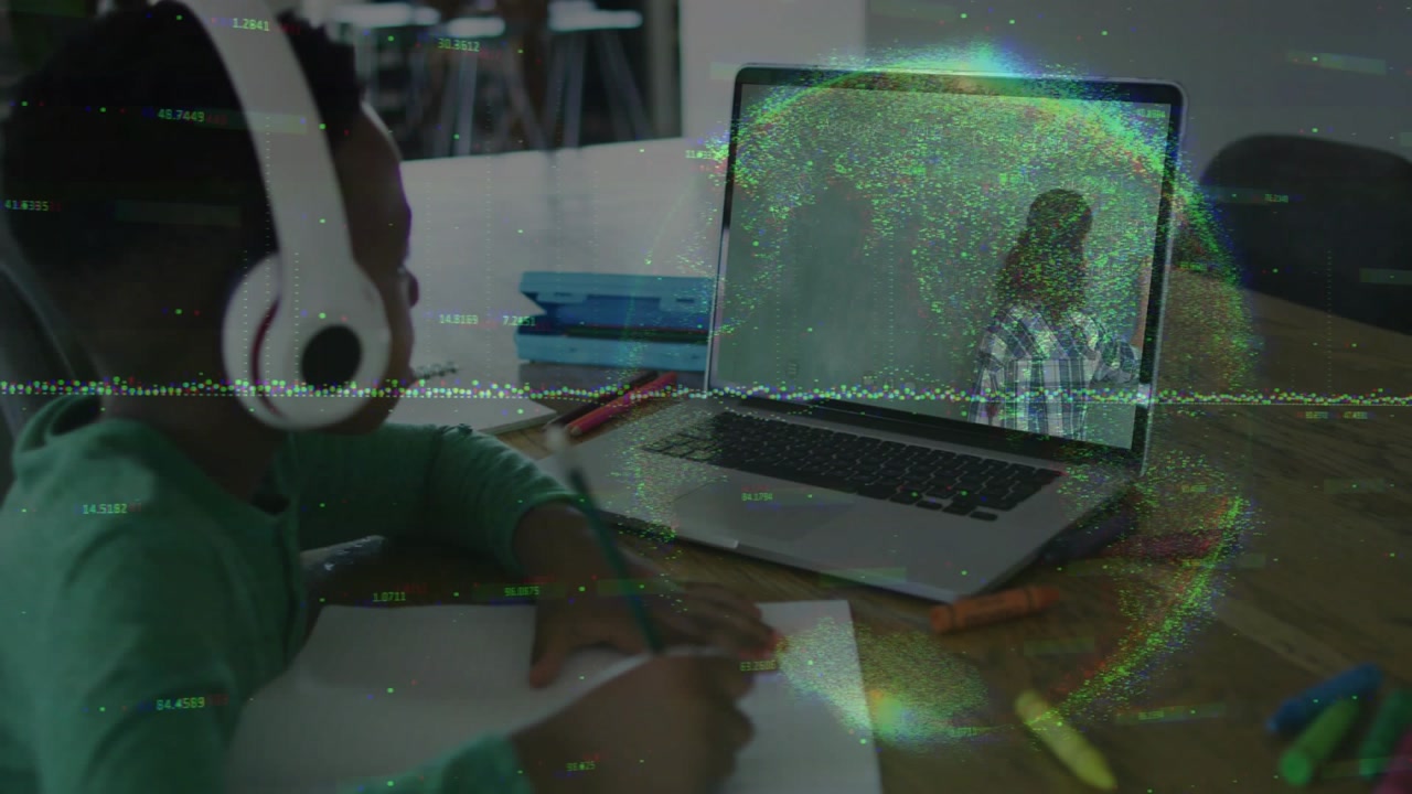 Child at laptop starting online education, writing while translucent globe waveform overlay moving