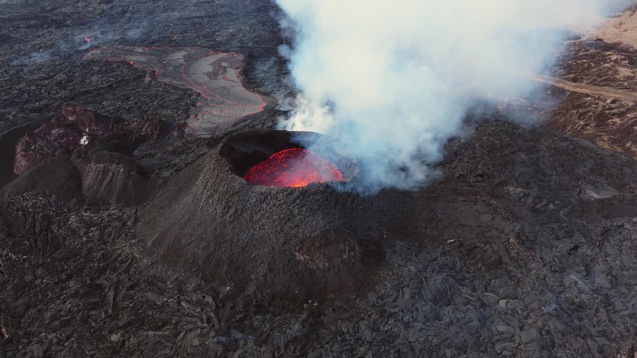 Eruption of Grindavík volcano crater in Iceland with smoke, lava, ash