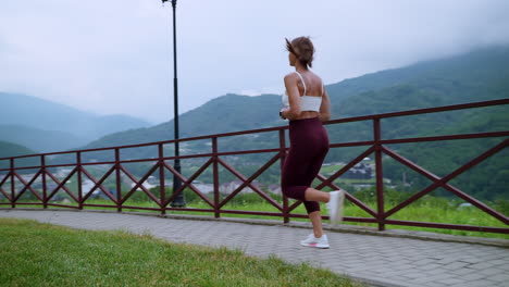woman running in mountains
