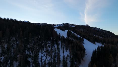 Early-morning-flying-over-snowy-mountains,-Valmalenco,-Italy-aerial-landscape