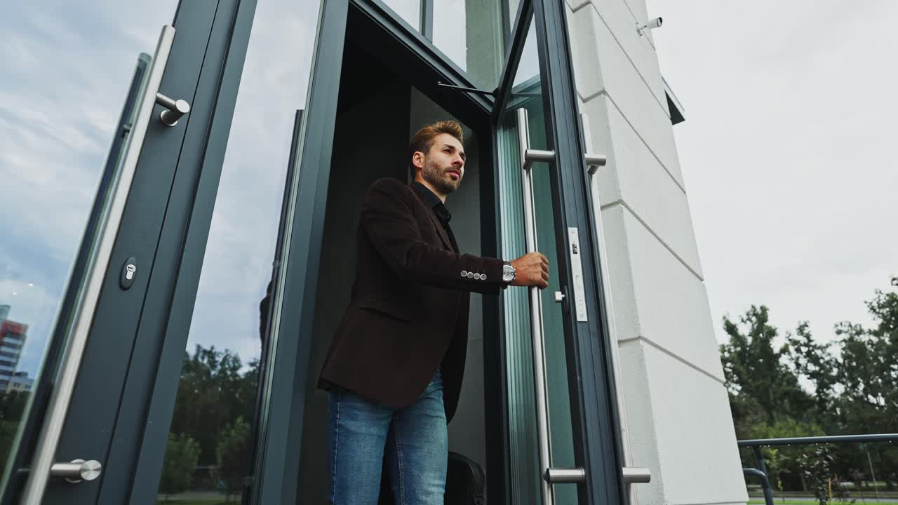 Businessman Leaving the Office Building