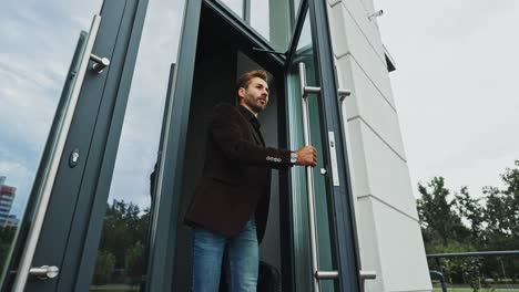 businessman leaving the office building