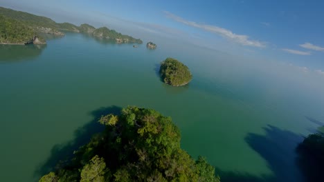 Fpv-Flight-over-idyllic-green-islands-at-Los-Haitises-National-Park-during-sunny-day,-Dominican-Republic