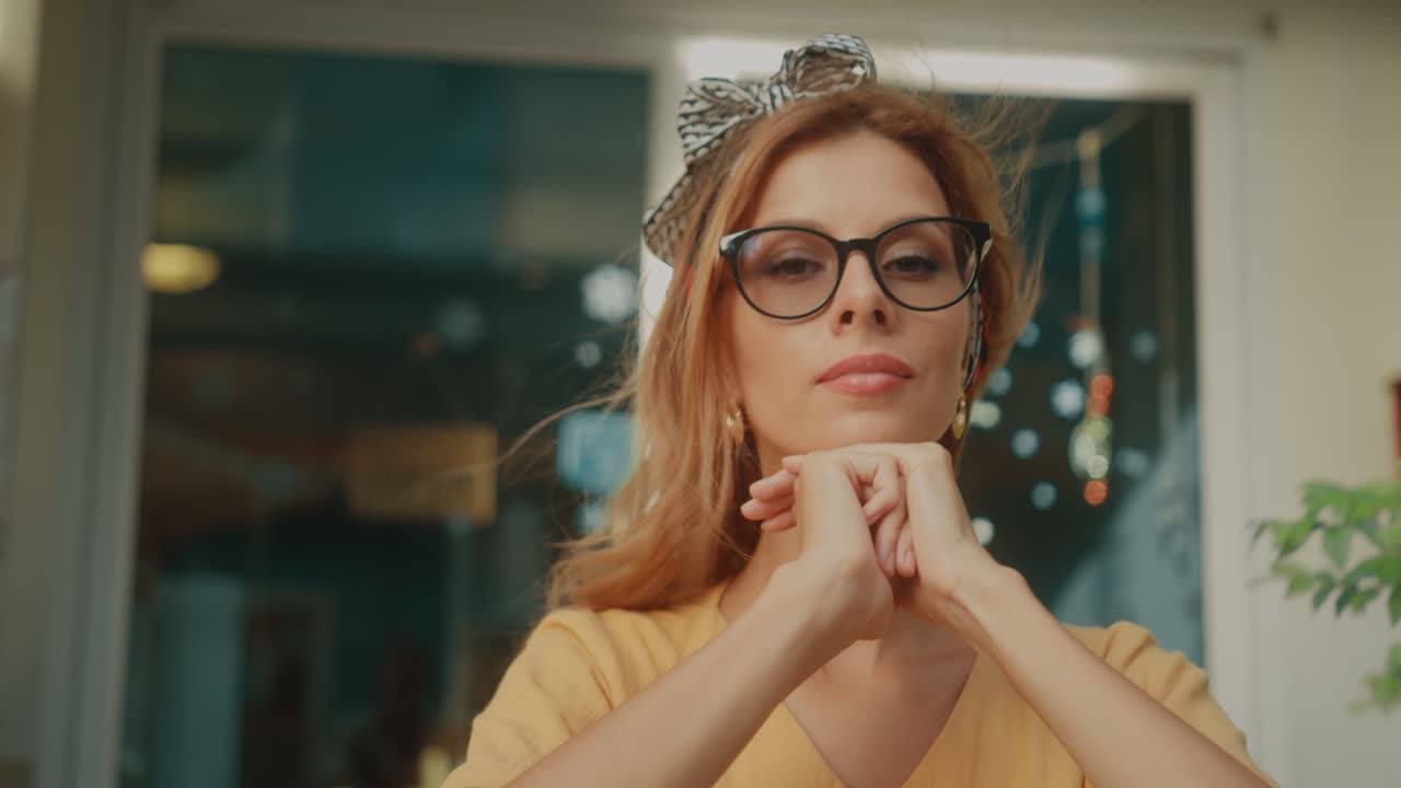 Woman with glasses and headband