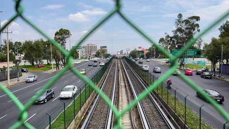 time-lapse of a large avenue in mexico city, below you can see the subway and cars passing by