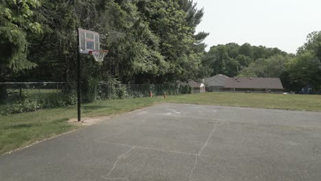 outside of school building grounds on basketball court