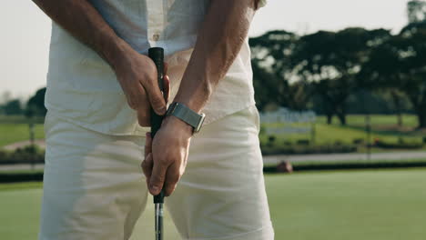 golfer preparing to hit