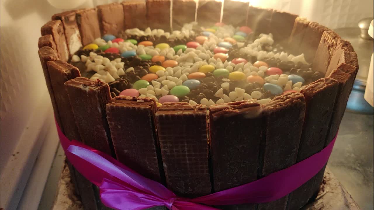 Beautiful cake made of for multiple colourful chocolates